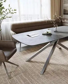 Jedálenské stoly DELIFE Jedálenský stôl Edge zaoblený 200x100 cm keramika betónová sivá krížová podstava obdĺžniková nerezová oceľ