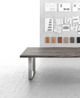 Jedálenské stoly DELIFE Jedálenský stôl Edge 220x100 cm XL akácia platinová nerezová oceľ úzky Live-Edge