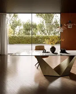Jedálenské stoly DELIFE Jedálenský stôl Edge 300×100 cm keramika onyx šampanské prizmový metalický zlatý