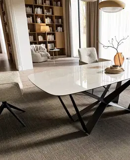Jedálenské stoly DELIFE Jedálenský stôl Edge zaoblený tvar 200x100 cm keramika onyx šampanské pavúk plochá oceľ čierna
