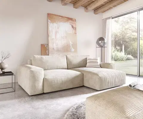 Rohové sedacie súpravy DELIFE Rohová pohovka Lanzo XL 270x180 cm manšester béžová variabilné ležadlo s taburetom