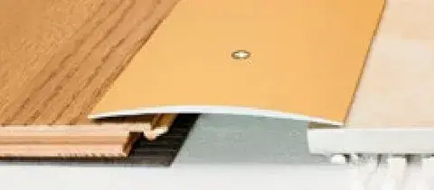 Přechodové lišty a profily Prechodový profil 100 mm, oblý (skrutkovací) | nivelácia 0 - 7 mm Šampaň E02