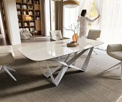 Jedálenské stoly DELIFE Jedálenský stôl Edge zaoblený tvar 200x100 cm keramika onyx champagne spider kov biela