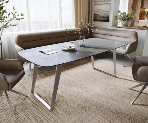 Jedálenské stoly DELIFE Jedálenský stôl Edge zaoblený 200x100 cm keramika betónová sivá nerezová oceľ skosený