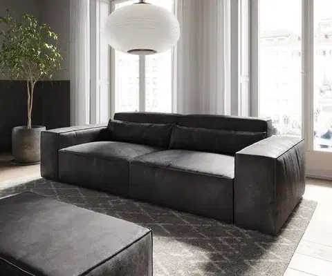 Veľké pohovky DELIFE Veľká pohovka Sirpio 230x95 cm imitácia kože vintage antracitová s taburetom