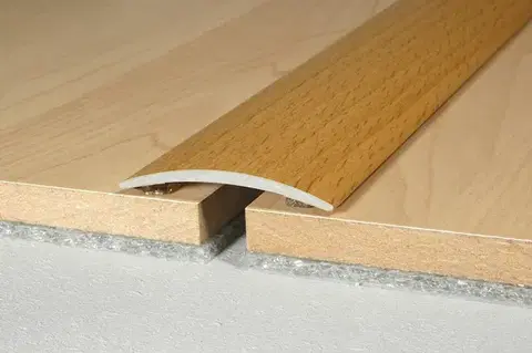 Přechodové lišty a profily Prechodový profil 40 mm, oblý (samolepiaci) | nivelácia 0 - 6 mm Dub rustical P62