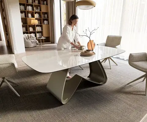 Jedálenské stoly DELIFE Jedálenský stôl Edge oválny 200x100 cm keramika onyx šampanské podstava v tvare W kov titánová farba