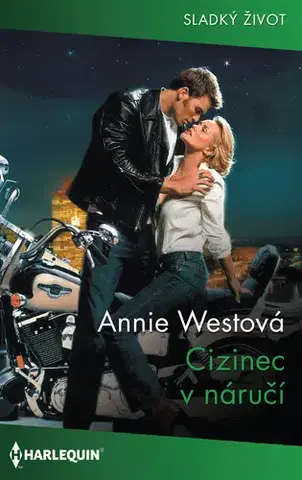Romantická beletria Cizinec v náručí - Annie West