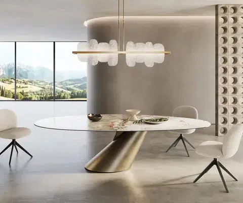 Jedálenské stoly DELIFE Jedálenský stôl Edge oválny 280x130 keramika Minas melange bielo-béžová Cono metalická zlatá